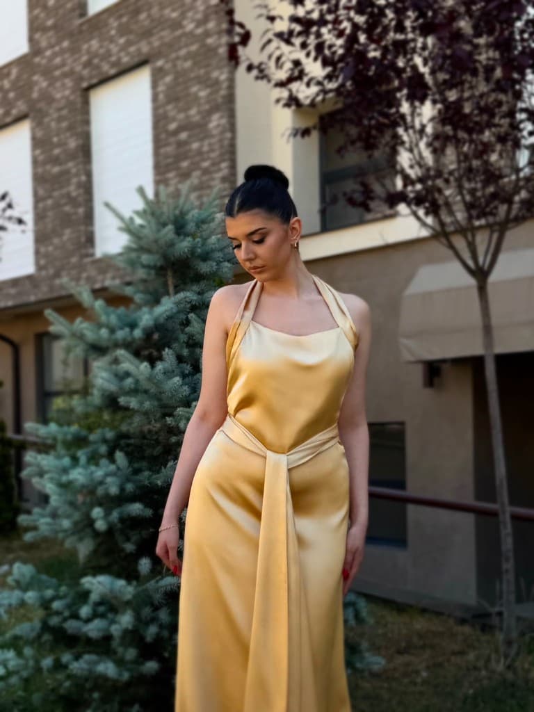 Gold sash satin dress — front view, looking down