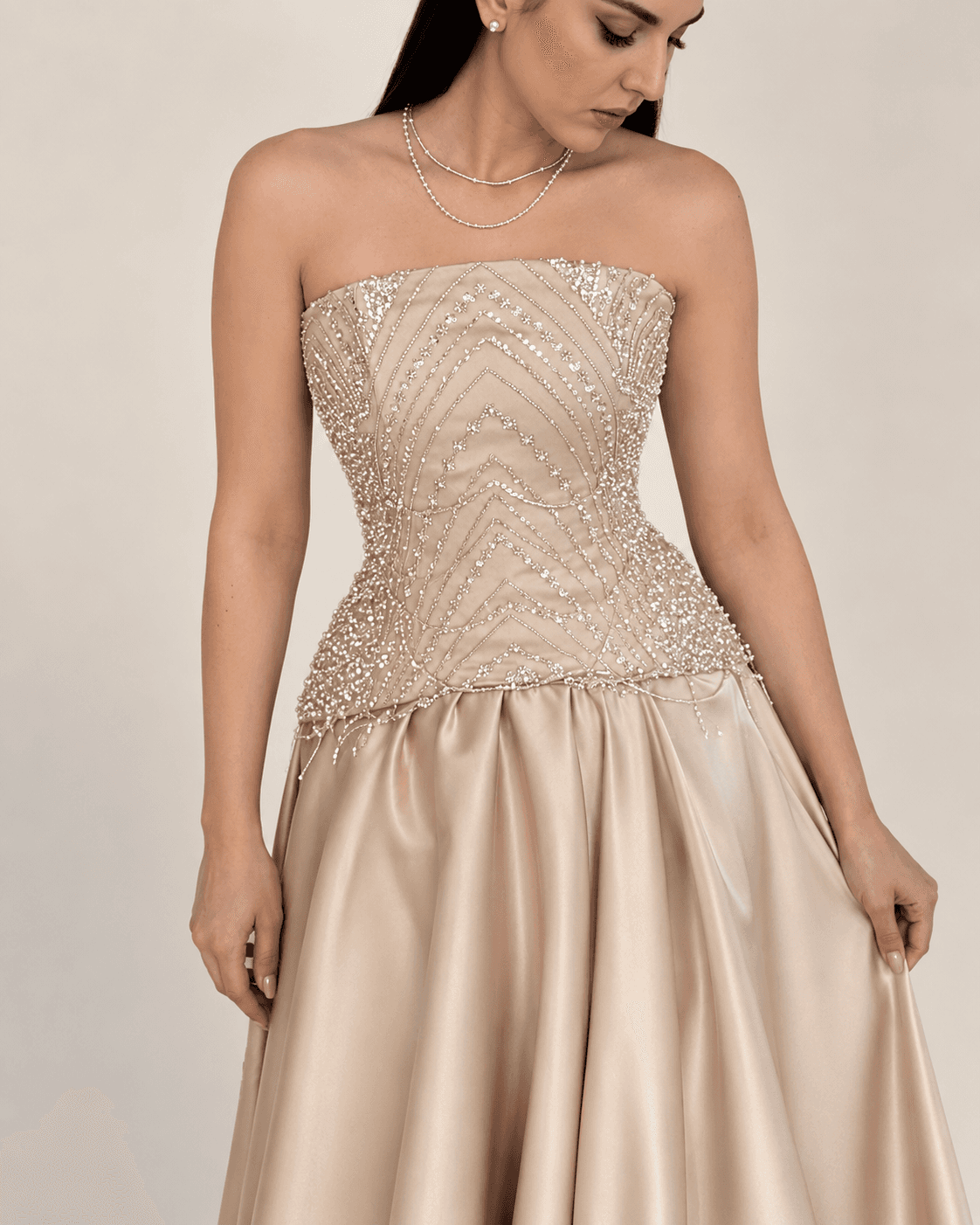 Champagne bead gown — seated view