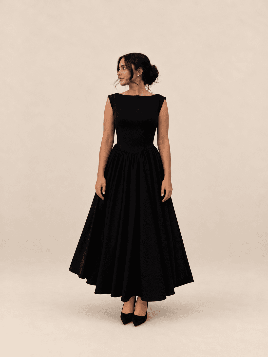 Noir flare dress — front view outdoors