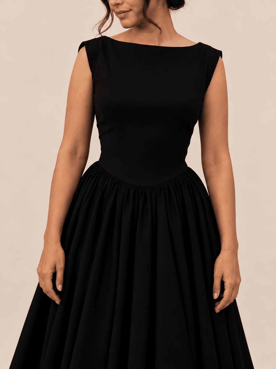 Noir flare dress — bodice and clutch detail