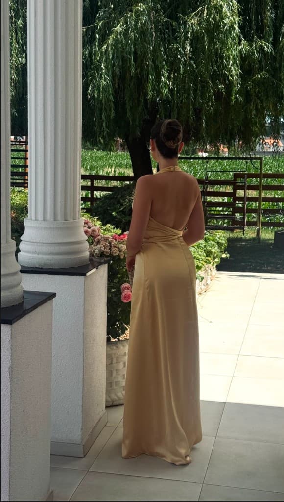 Champagne satin halter dress — open back view